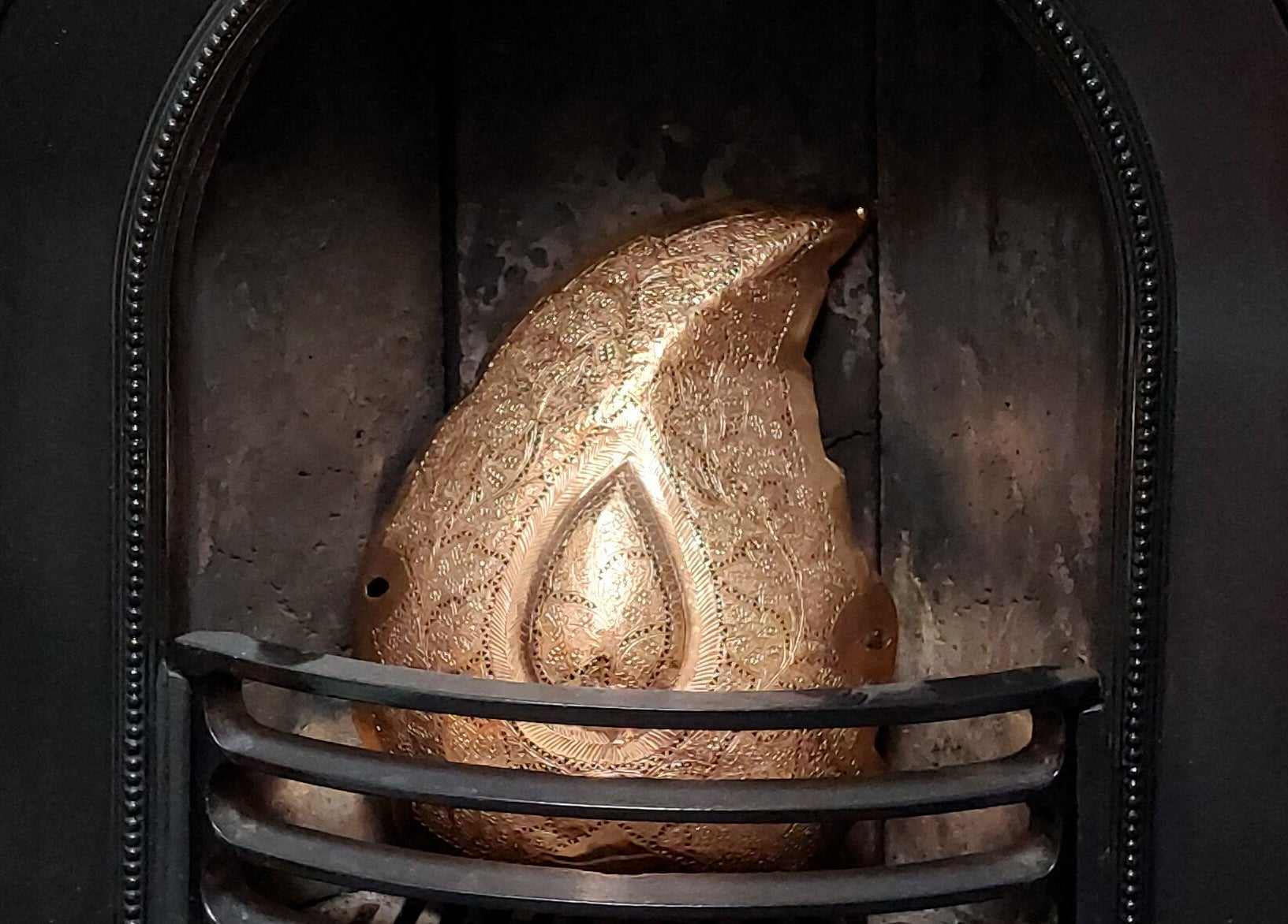 Ornate gold fireplace detail at City Zen Sanctuary, Edinburgh, Scotland, GB.