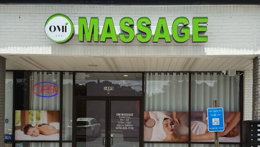 OMI MASSAGE entrance in Lawrenceville, Georgia, US showcasing spa services and inviting exterior.