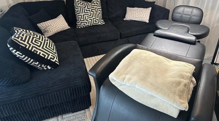 Luxurious seating and massage chair at Ink & Lam, London, England, GB.