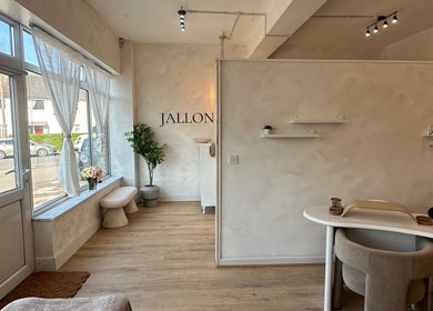 Bright interior of Hair By Macey Coles in Clifton, England, GB with modern decor and natural light.