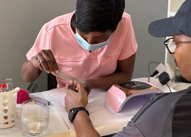 Professional manicure at Nails By Prim, Sandton, Gauteng, ZA, showcasing expert nail care services.