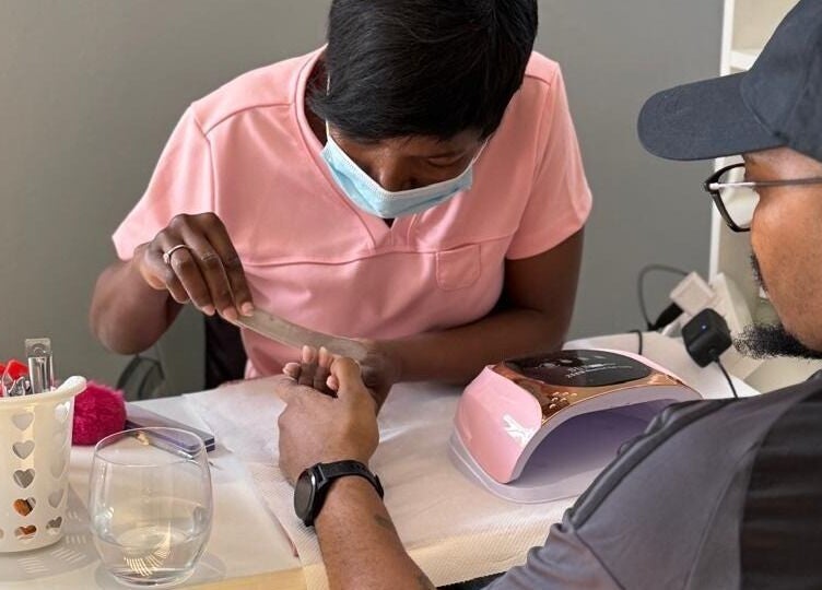 Professional manicure at Nails By Prim, Sandton, Gauteng, ZA, showcasing expert nail care services.