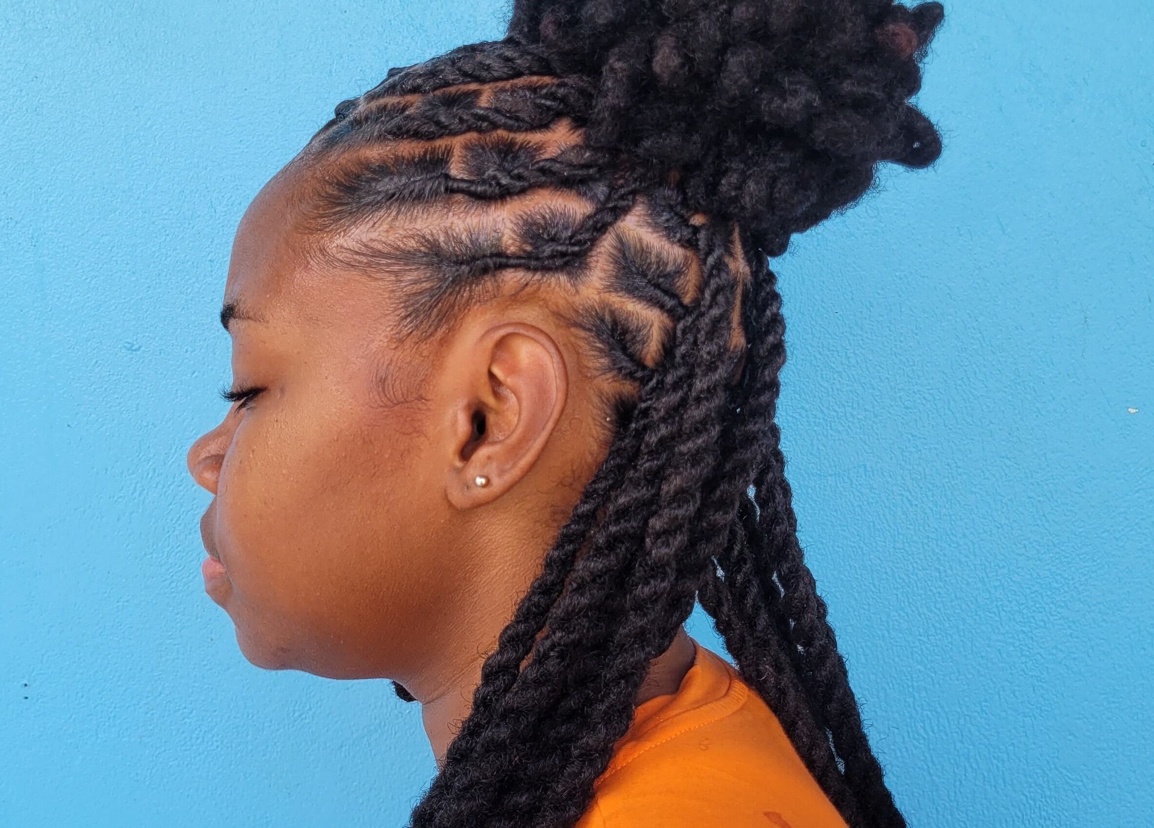 Elegant braided hairstyle at The Hair Haven, DM offering expert hair care services.