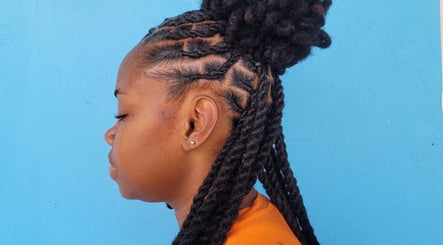 Elegant braided hairstyle at The Hair Haven, DM offering expert hair care services.