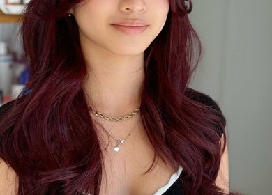 Rich burgundy hair styled in soft waves at MopheadbyMayNoh, Richmond, British Columbia, CA.