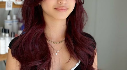 Rich burgundy hair styled in soft waves at MopheadbyMayNoh, Richmond, British Columbia, CA.
