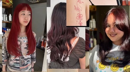 Hairstyles and tattoos at May Noh @Mophead, Richmond, British Columbia, CA. Vibrant red, curled brunette, and floral tattoo.
