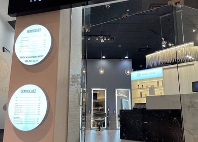 Interior view of May Noh @Mophead salon entrance in Richmond, British Columbia, CA with service list displayed.