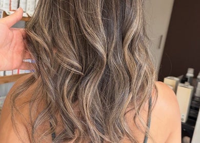 Elegant wavy hairstyle at May Noh @Mophead in Richmond, British Columbia, CA showcasing rich brunette tones.