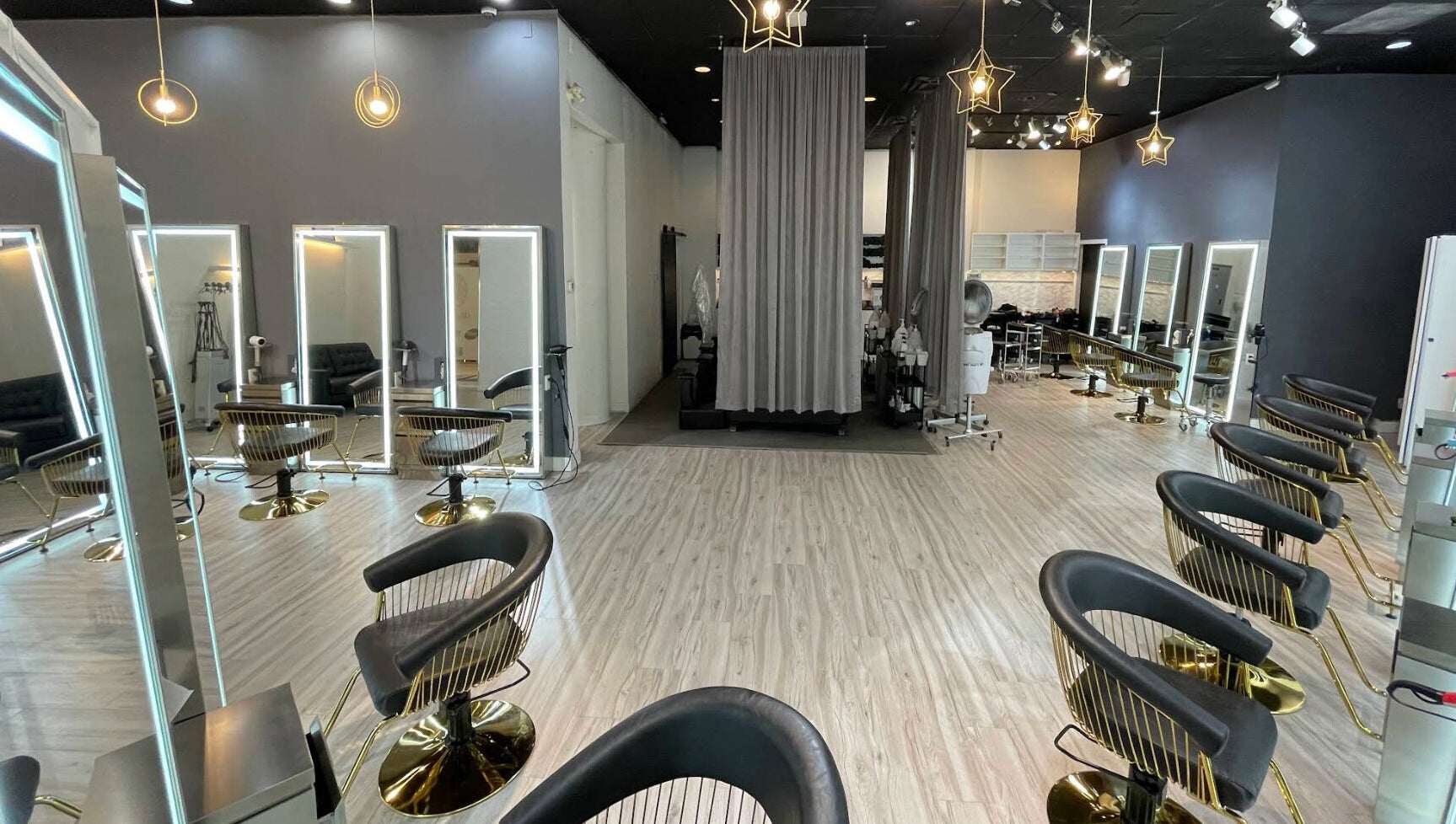 Interior of May Noh at Mophead, Richmond, British Columbia, CA, featuring chic styling stations and modern decor.