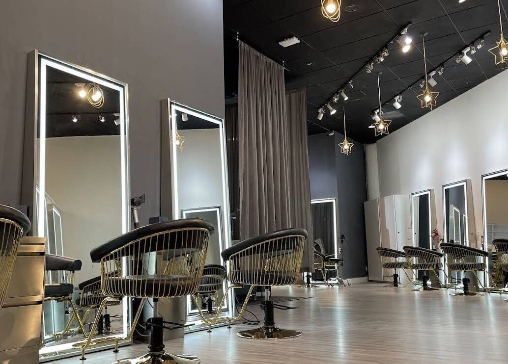 Modern salon interior at May Noh at Mophead, Richmond, British Columbia, CA with stylish chairs and star lighting.