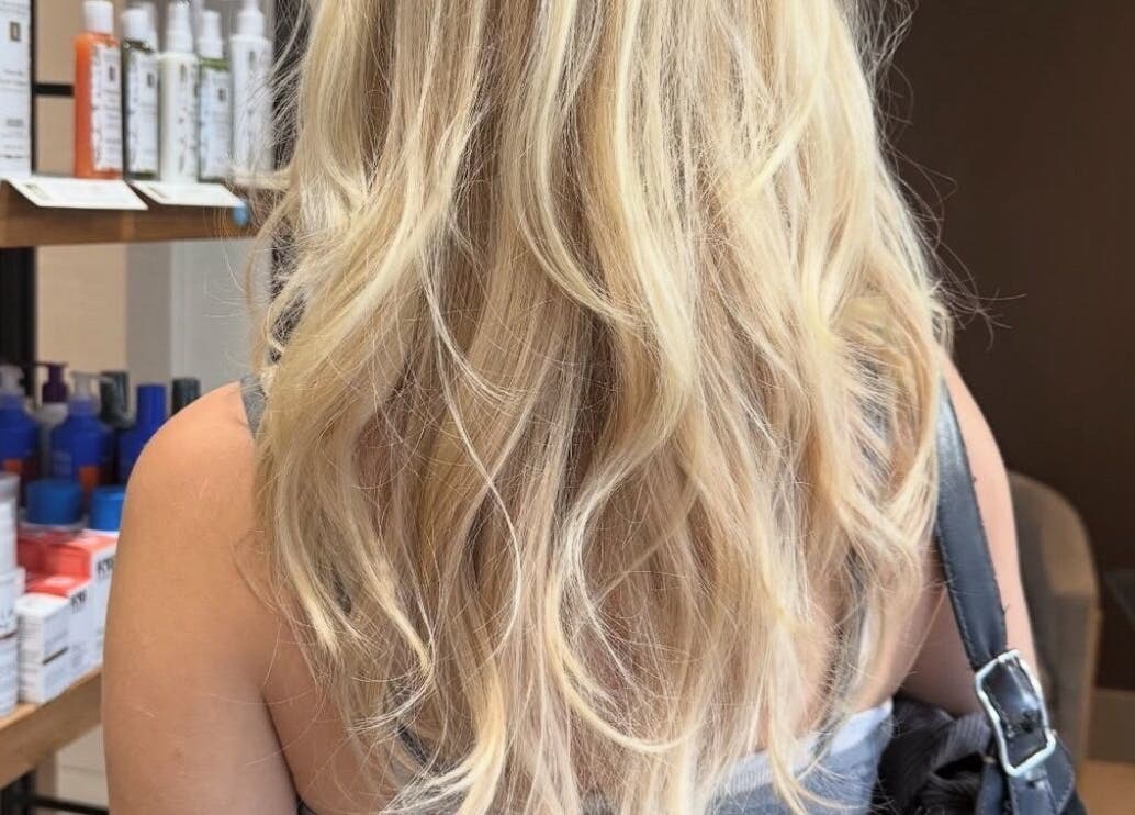 Blonde hair styled at May Noh at Mophead, Richmond, British Columbia, CA, highlighting luxurious treatments.