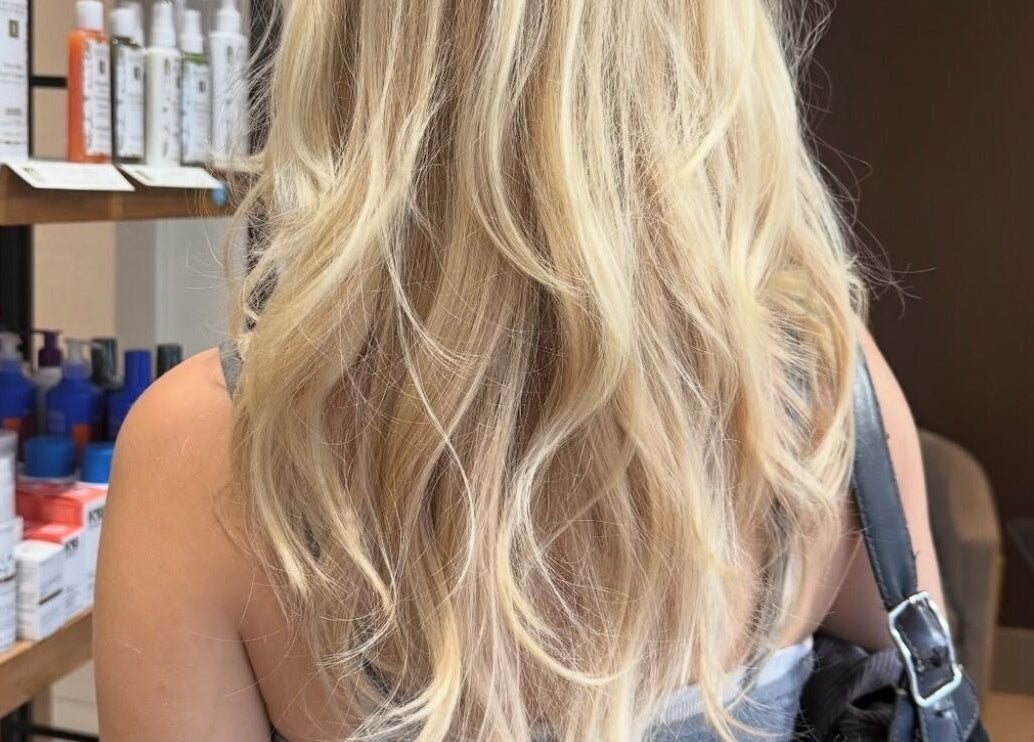 Blonde hair styled at May Noh at Mophead, Richmond, British Columbia, CA, highlighting luxurious treatments.