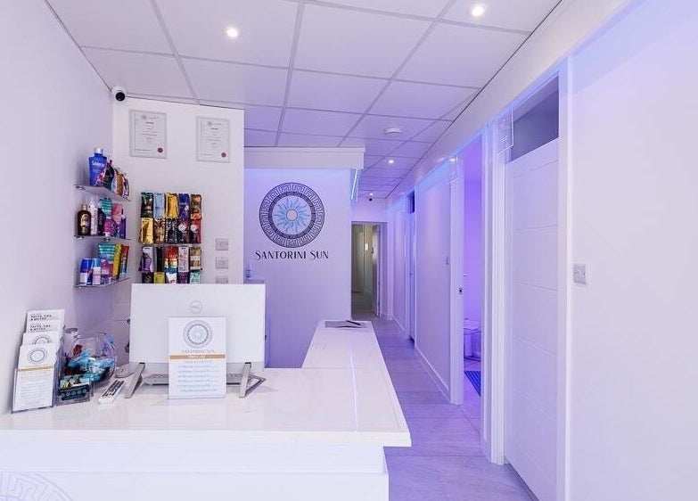 Reception area at Gypsie Rose, Southampton, England, GB, featuring a modern design with beauty products on display.