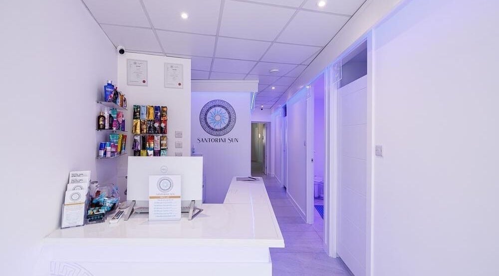 Reception area at Gypsie Rose, Southampton, England, GB, featuring a modern design with beauty products on display.
