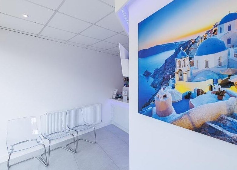 Modern waiting area with clear chairs at Gypsie Rose, Southampton, England, GB featuring calming wall art.