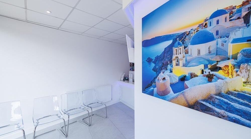 Modern waiting area with clear chairs at Gypsie Rose, Southampton, England, GB featuring calming wall art.