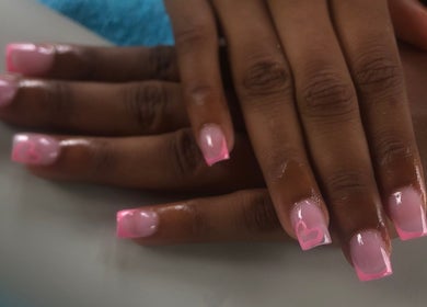 Elegant pink nail art with heart design by Nailsbynana in Porus, Manchester Parish, JM.