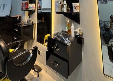 Modern styling chair and mirror at TrimLine Salon, Karachi, Sindh, PK.