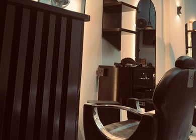 Interior view of sophisticated seating at TrimLine Salon, Karachi, Sindh, PK.