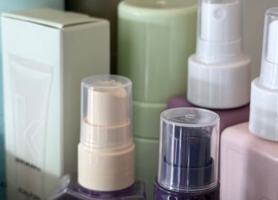 Various beauty bottles at Tam’s Chair in Cape Town, Western Cape, ZA offer premium skincare solutions.
