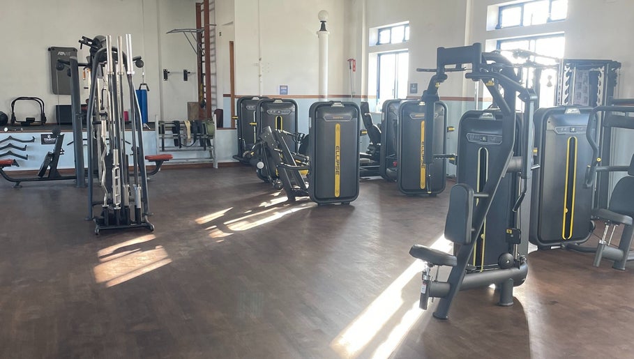 Modern gym equipment at Ginasio Hs, Vila Nova De Milfontes, Beja, PT with sleek, state-of-the-art machines.