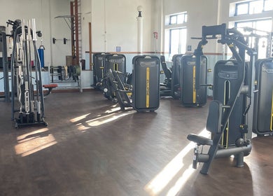 Modern gym equipment at Ginasio Hs, Vila Nova De Milfontes, Beja, PT with sleek, state-of-the-art machines.