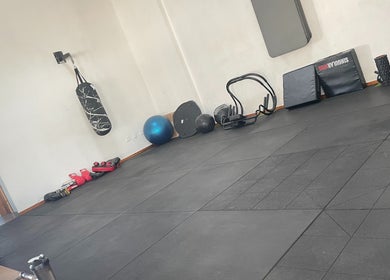 Gym equipment setup at Ginasio Hs, Vila Nova De Milfontes, Beja, PT showcasing fitness tools for wellness.