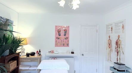 Massage therapy room with soothing decor at Gem Massage Therapy, Enfield, England, GB.