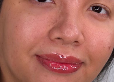 Close-up of shiny lips and smooth skin at Blushed By Soph, Runcorn, England, GB.