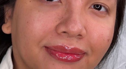Close-up of shiny lips and smooth skin at Blushed By Soph, Runcorn, England, GB.