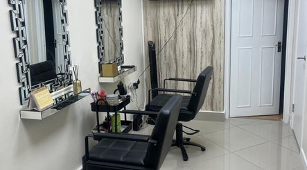 Elegant salon chairs and mirrors at Maia Cosmetics, London, England, GB, showcasing a refined ambiance.