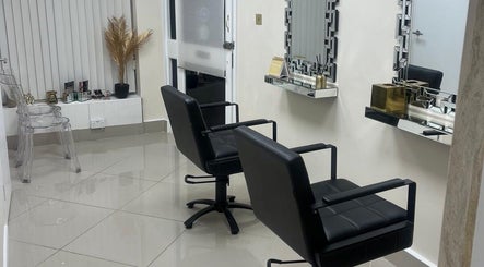 Modern salon chairs and mirrors at Maia Cosmetics in London, England, GB.