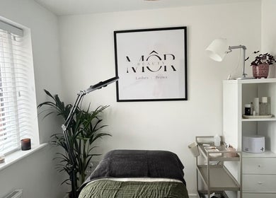 Cozy treatment room at MÔR Beauty in Rhoose, Wales, GB with stylish decor and beauty essentials.