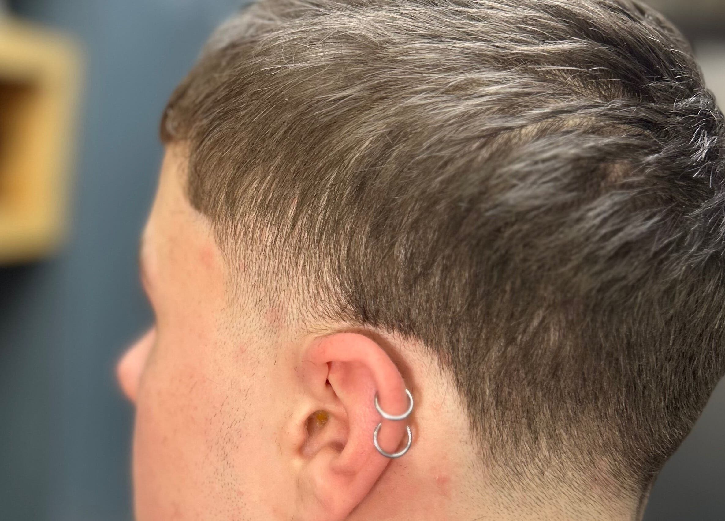 Close-up of a stylish fade haircut at WMCuts, Shrewsbury, England, GB.