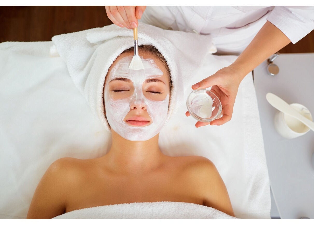 Facial treatment at Solace Spa in Miami, Florida, US. Relaxing experience with facial mask application.