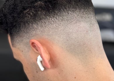 Close-up of a sharp fade haircut at Chilly.Da.Barber(of FAMA Cuts), Los Angeles, California, US.
