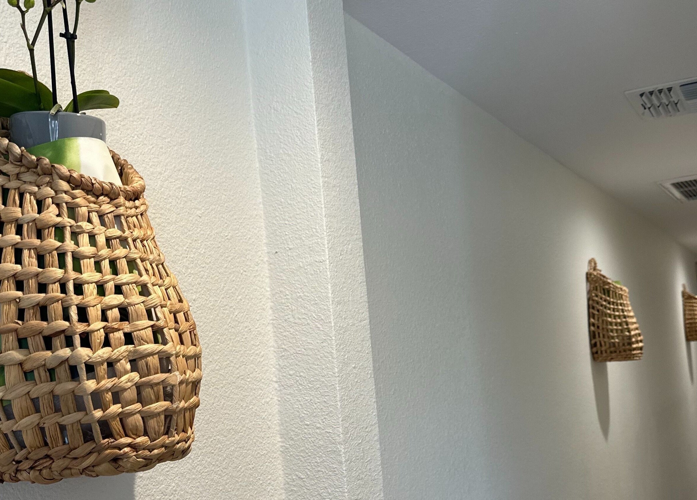 Woven baskets on a calm wall at Creative Spa & Az Siam Thai Massage, Scottsdale, Arizona, US.