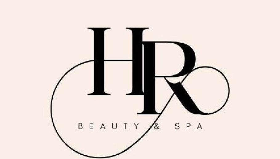 HR Beauty & Spa logo in Fairfield Heights, New South Wales, AU, on soft pink background.