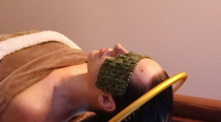 Relaxing spa treatment at Oula Head Spa, Brisbane, Queensland, AU showcases ultimate relaxation and calmness.