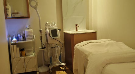 Cozy treatment room at Yuan Essence Skin Hub, Puchong, Selangor, MY with modern skincare equipment.
