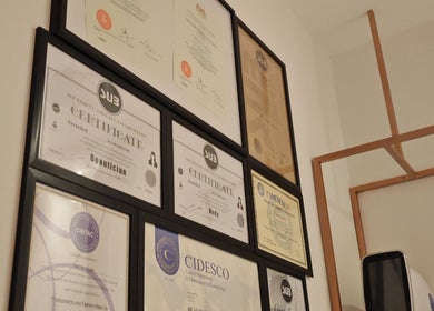 Certification display at Yuan Essence Skin Hub, Puchong, Selangor, MY, showcasing expert credentials.