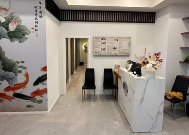 Welcoming reception of Massage Legendary, Taigum, Queensland, AU with lotus artwork and elegant decor.
