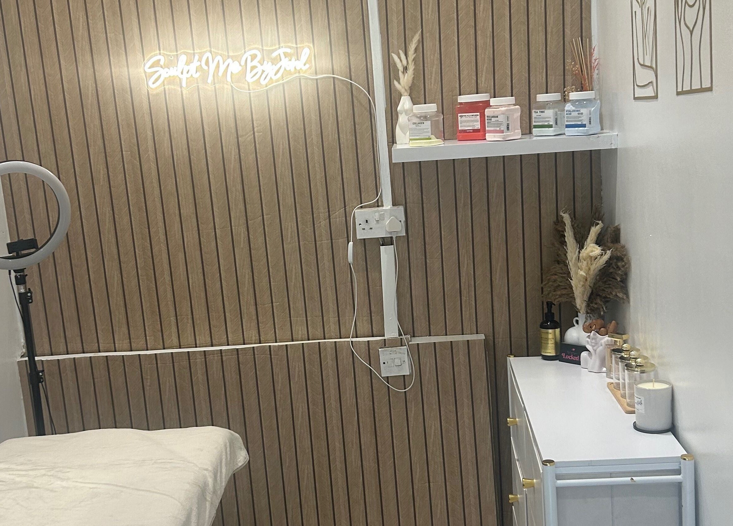 Sculptmebyjord's modern treatment room with decor and products in Ilford, England, GB.