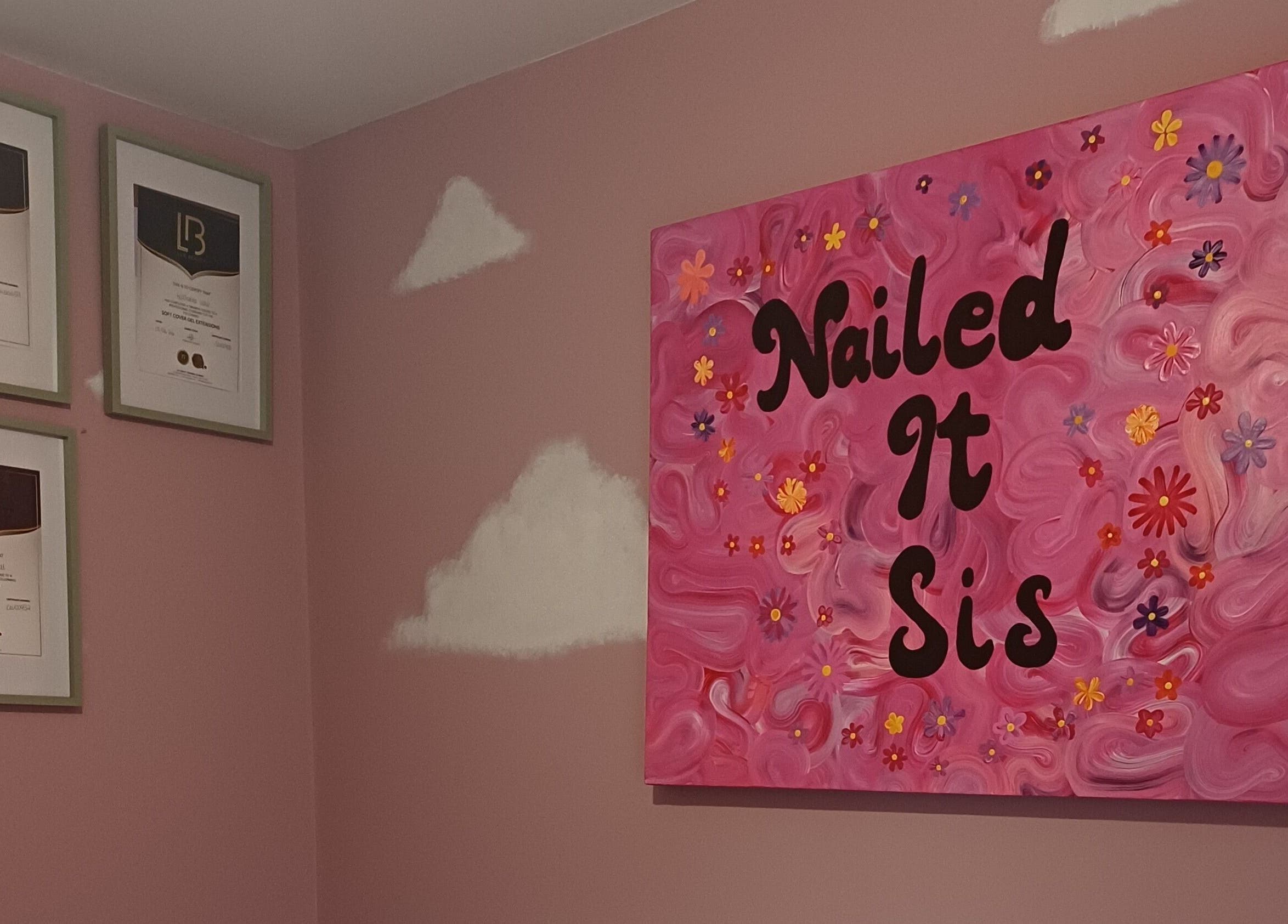 Colorful Nailed It Sis wall art and certificates in Stafford, England, GB beauty venue.