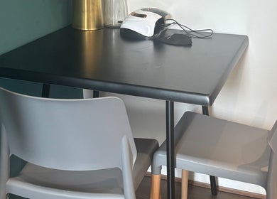 Modern nail table setup at Nailed By Amii, Leeds, England, GB with sleek decor and equipment.