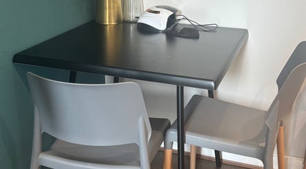 Modern nail table setup at Nailed By Amii, Leeds, England, GB with sleek decor and equipment.