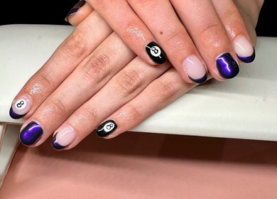 Purple and black nail art at Nailed By Amii in Leeds, England, GB, featuring a stylish 8-ball design.