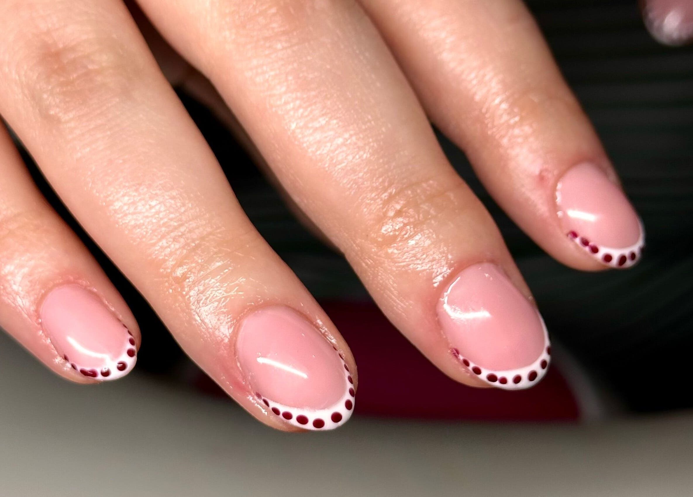 Elegant polka dot nail design by Nailed By Amii in Leeds, England, GB.