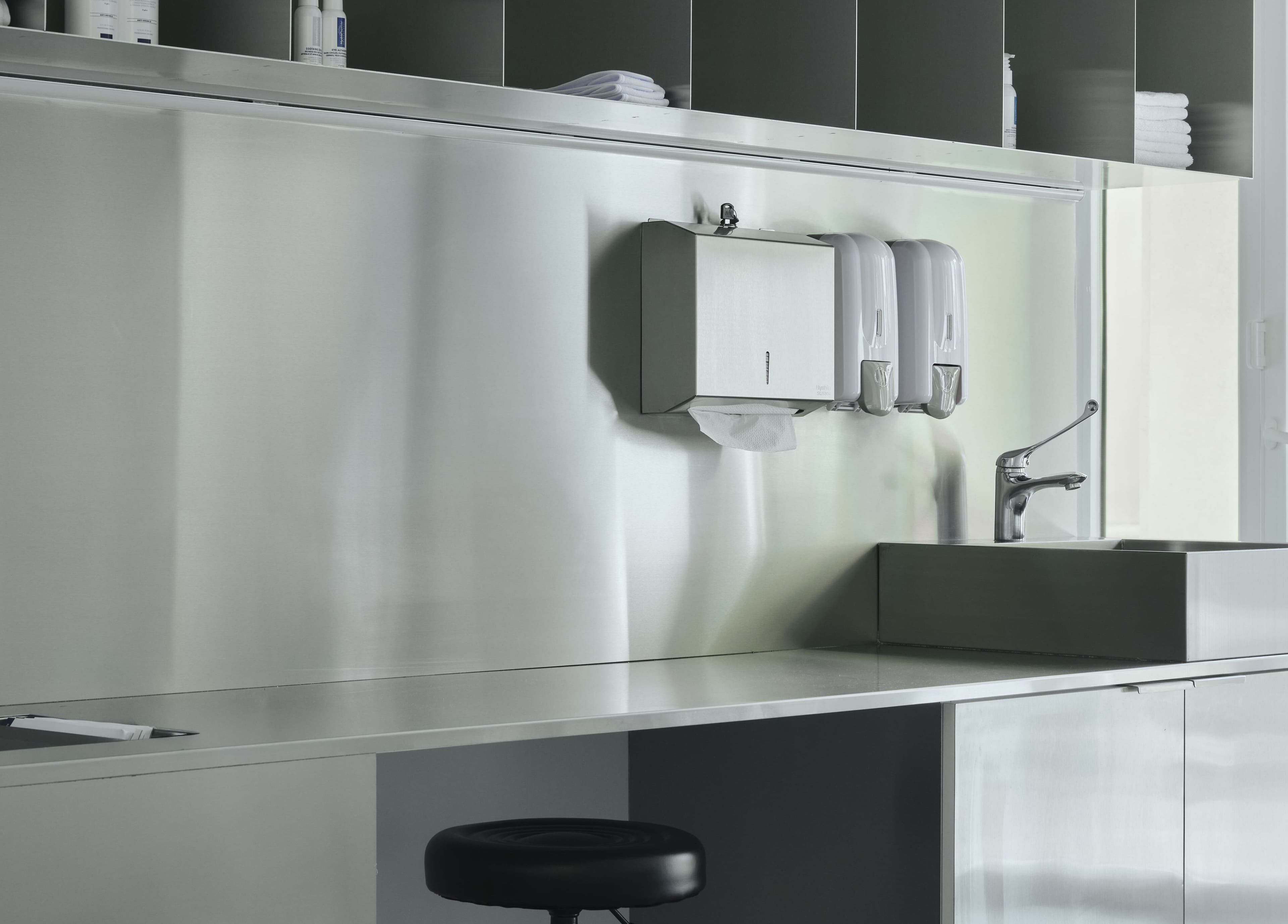 Modern stainless steel sink area at DIFFERENT Clinic in Abu Dhabi, Abu Dhabi, AE, showcasing hygiene standards.